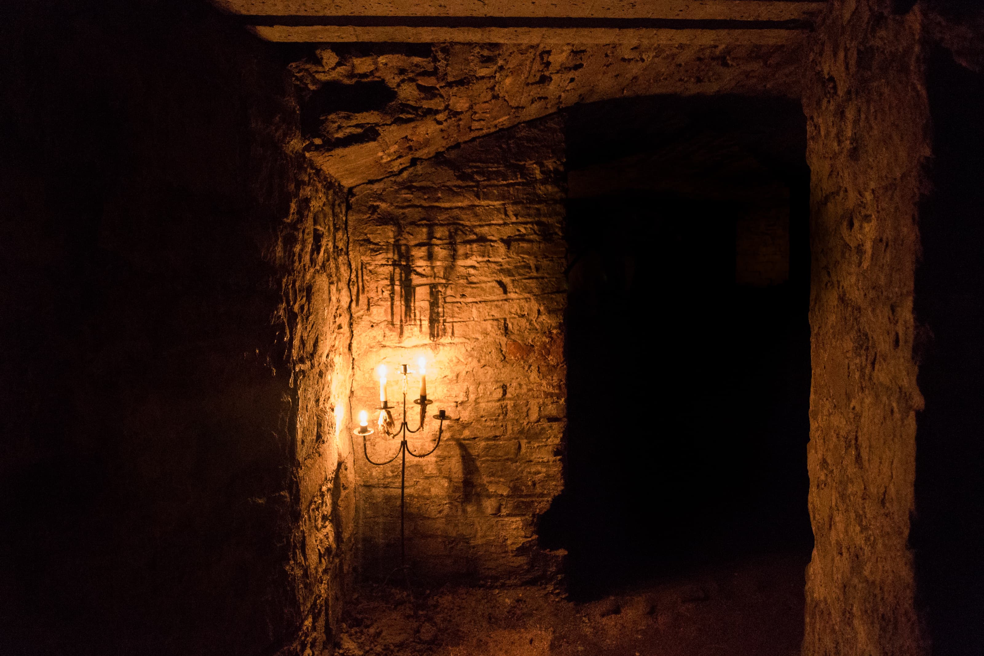 A dark stone chamber in Edinburgh’s historic vaults
